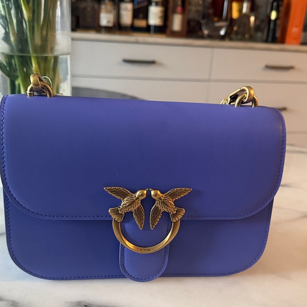 Elegant Blue Bag with Gold Accents